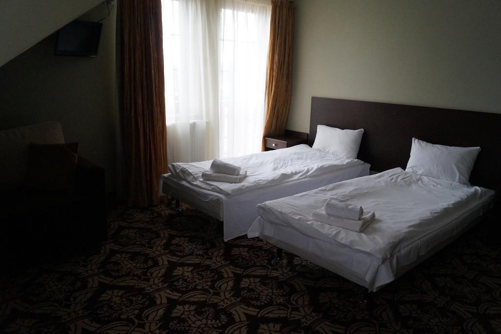 Hotel Sloneczny Brzeg Biskupiec  Szoba fotó